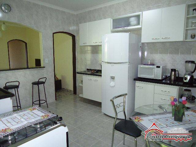 Casa à venda com 3 quartos, 90m² - Foto 11