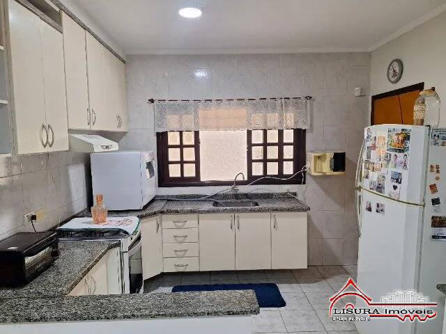 Casa à venda com 3 quartos, 214m² - Foto 6