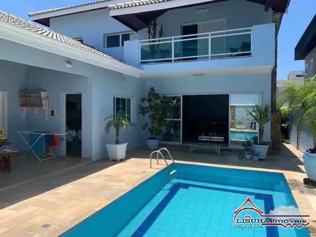 Casa de Condomínio à venda com 4 quartos, 327m² - Foto 1